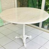 Round marble table with central cast iron leg