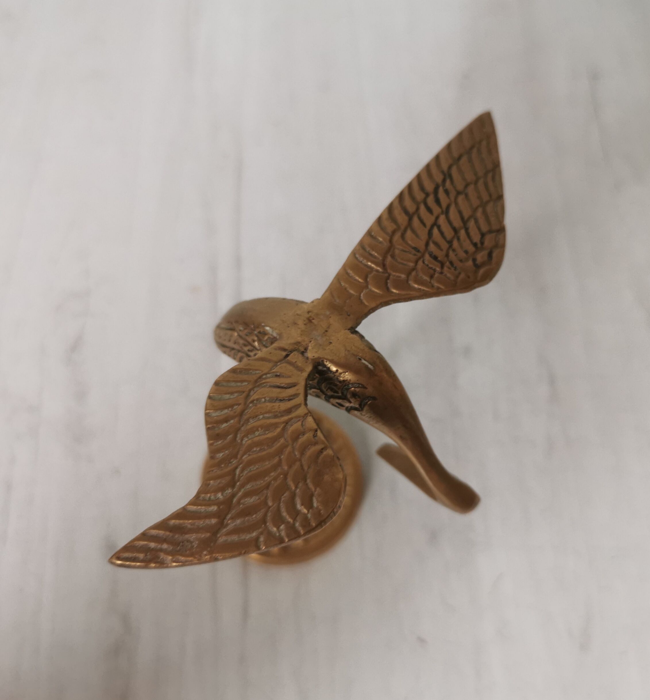 Brass heron