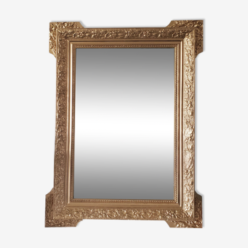 Antique mirror with gilded wood crests