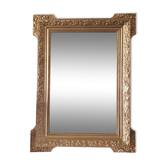 Antique mirror with gilded wood crests