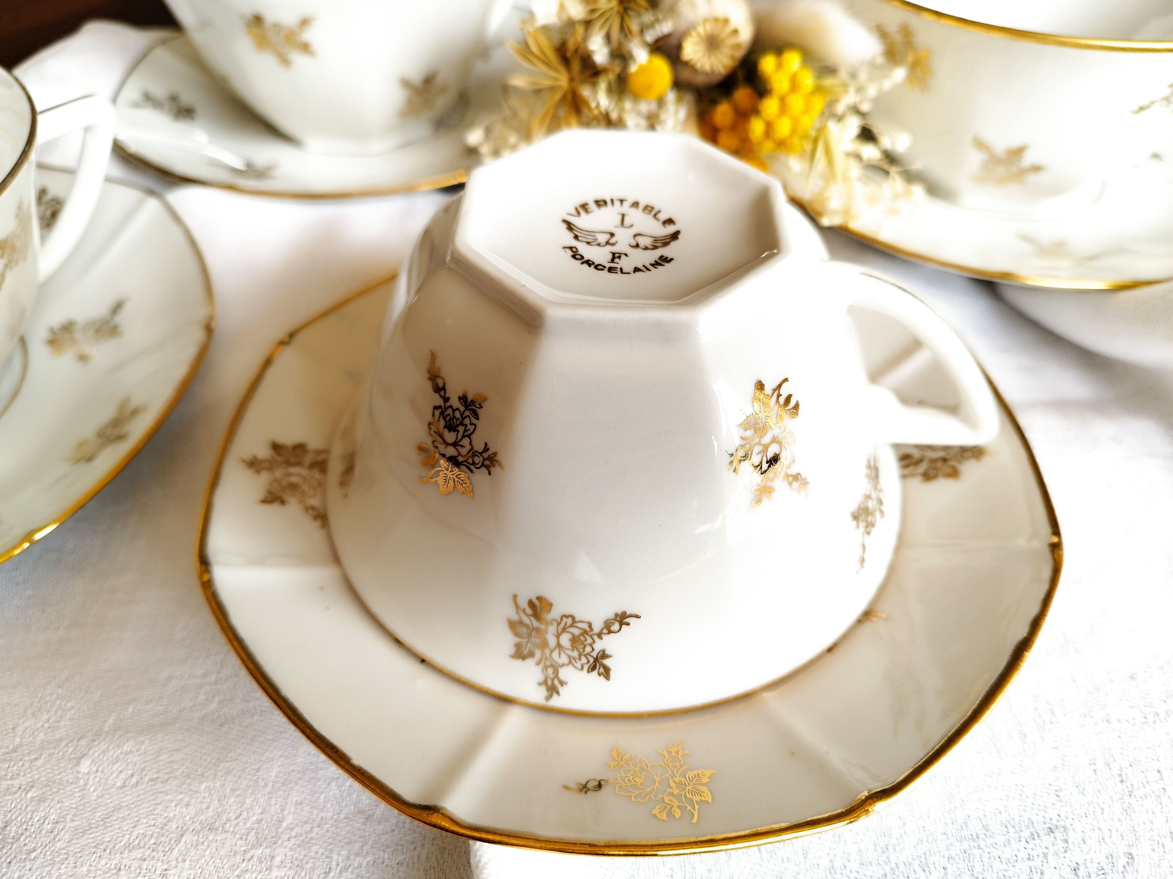 Set of 4 white porcelain cups