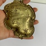 Empty art nouveau brass pocket