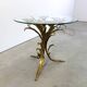Charming metal flower coffee table or side table with a clear glass top. Made in Italy, attributed to Hans Kögl.