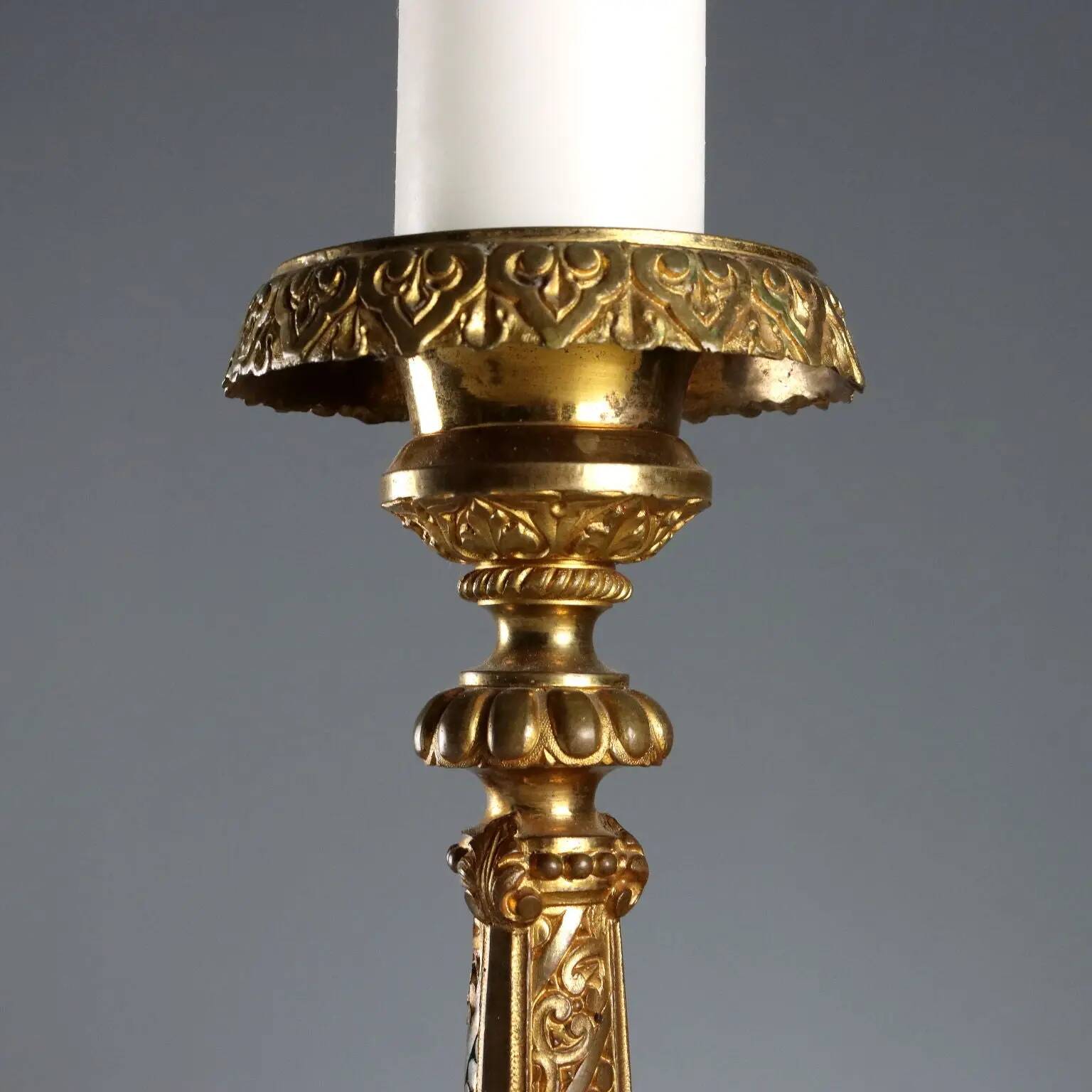 Antique gilded bronze candelabrum, 19th-century decorations.