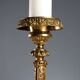 Antique gilded bronze candelabrum, 19th-century decorations.