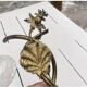 Antique bronze and brass mounted vase with engraved glassware