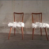 Pair of vintage Scandinavian Hygge chairs in solid wood and synthetic Mongolian sheepskin seat
