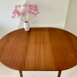 Round teak dining table Scandinavian design