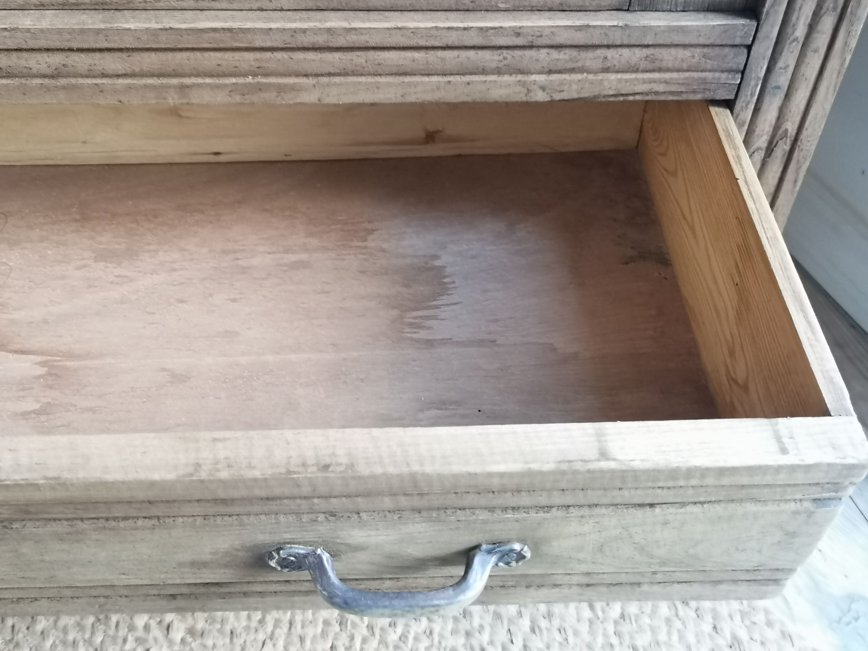 Stripped parisian wardrobe, raw wood