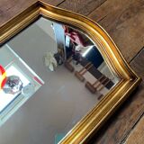 Large long mirror in gilded wood