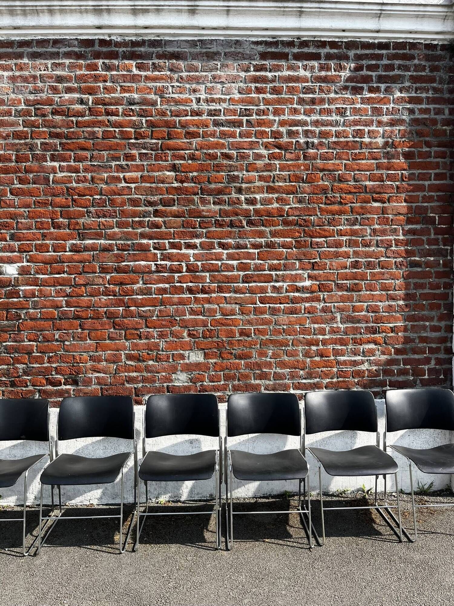 Set of 6 black metal chairs, model GF 40/4 by David Rowland.