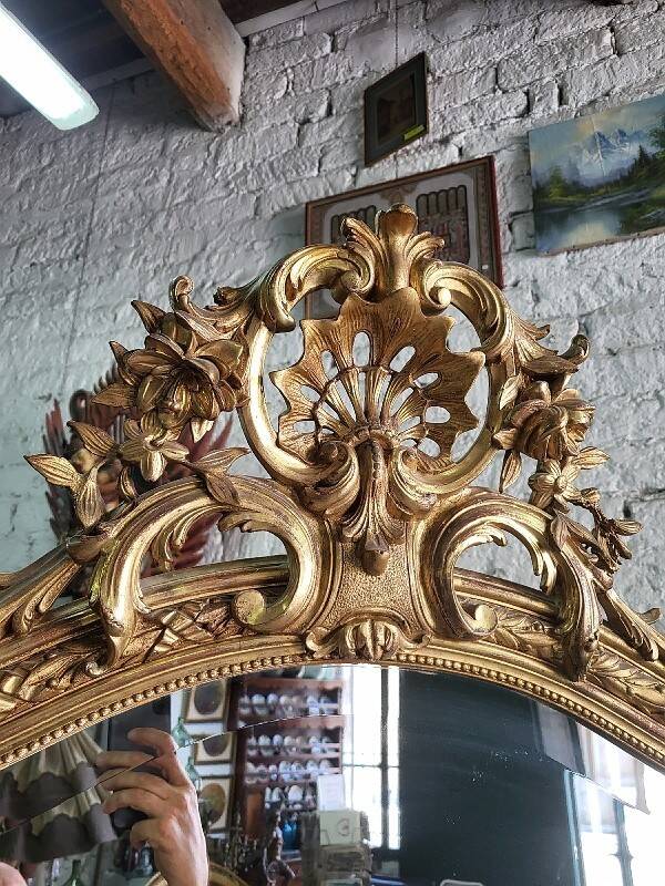 Large Louis XV gilded shell mirror from the 19th century