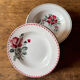 Mismatched plates l'Amandinoise