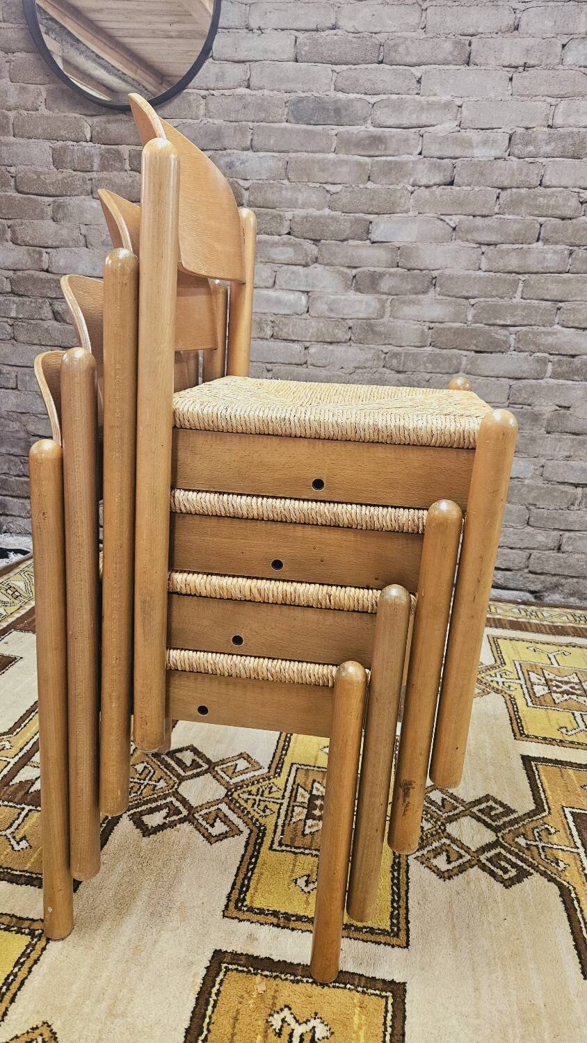 4 straw chairs in the vintage Charlotte Perriand 1970 style