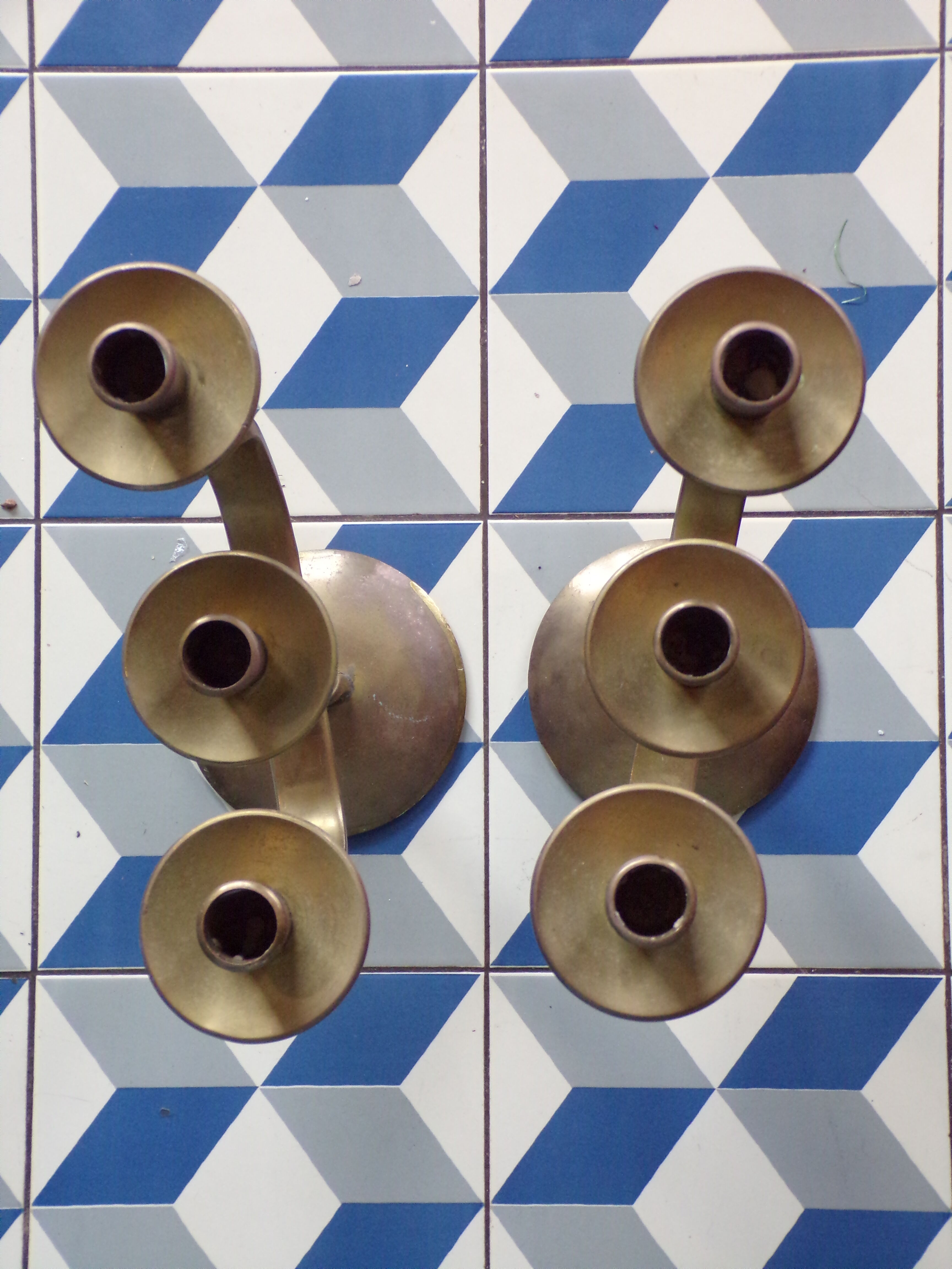 Pair of brutalist bronze candle holders