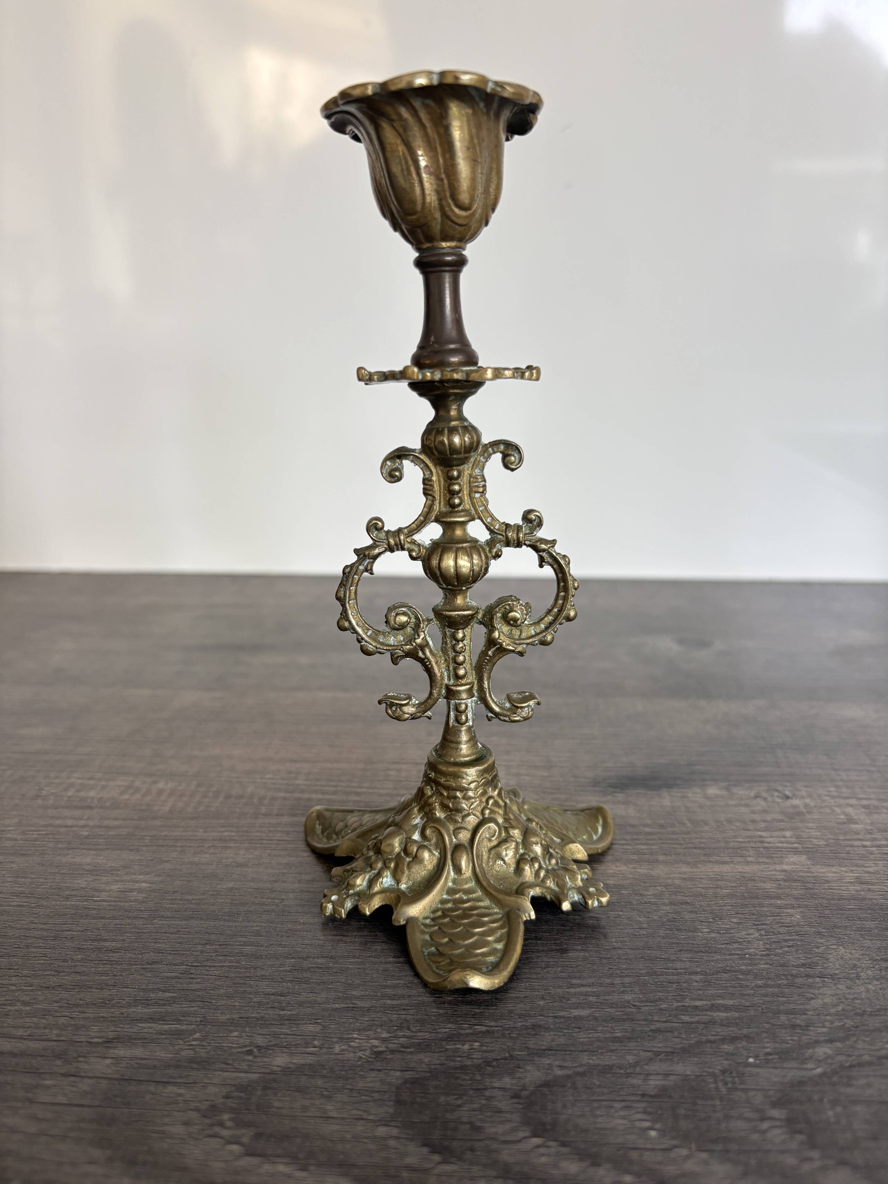 Antique chiselled bronze candlestick