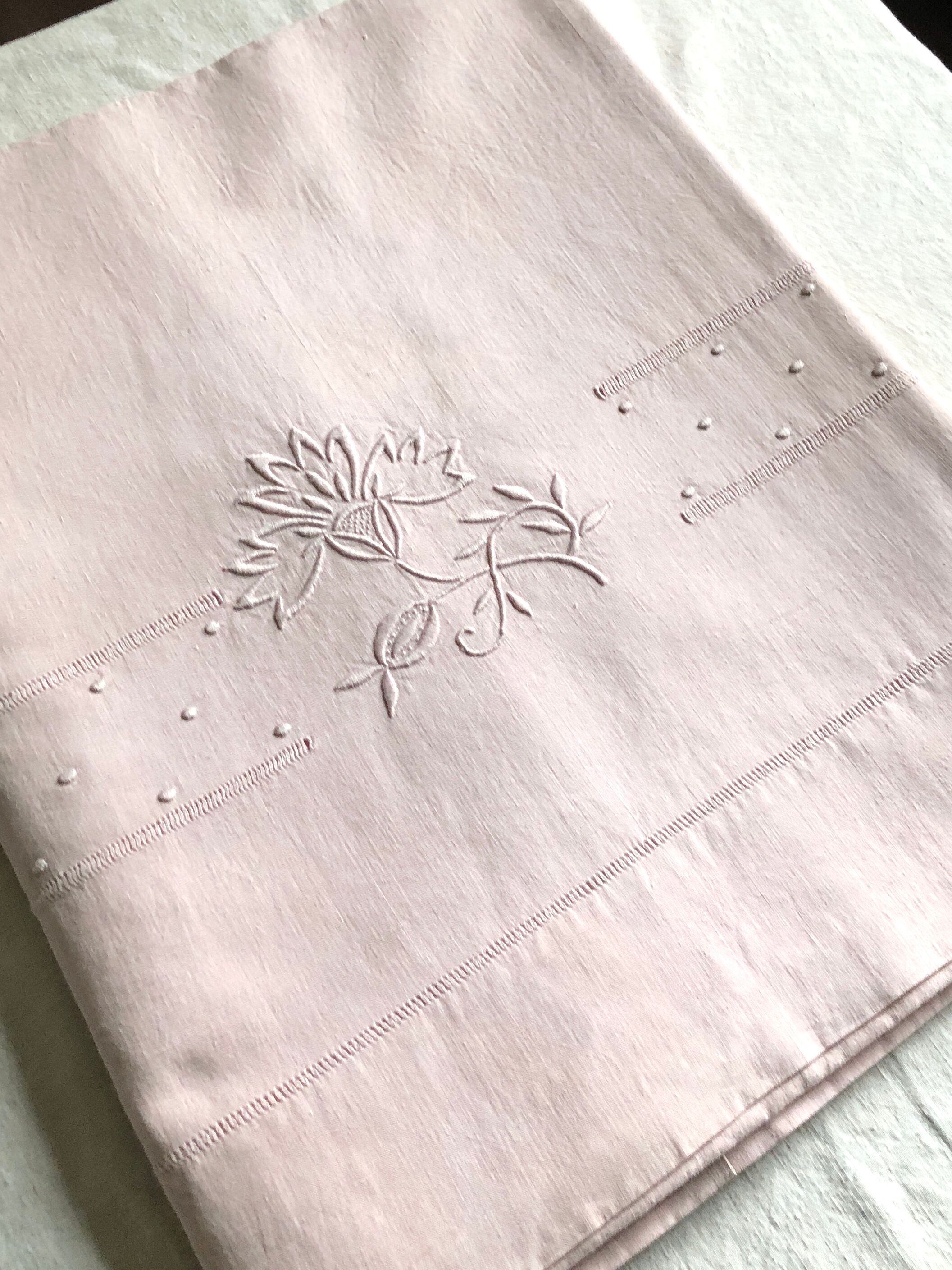 Antique linen and cotton towel dyed in soft pink