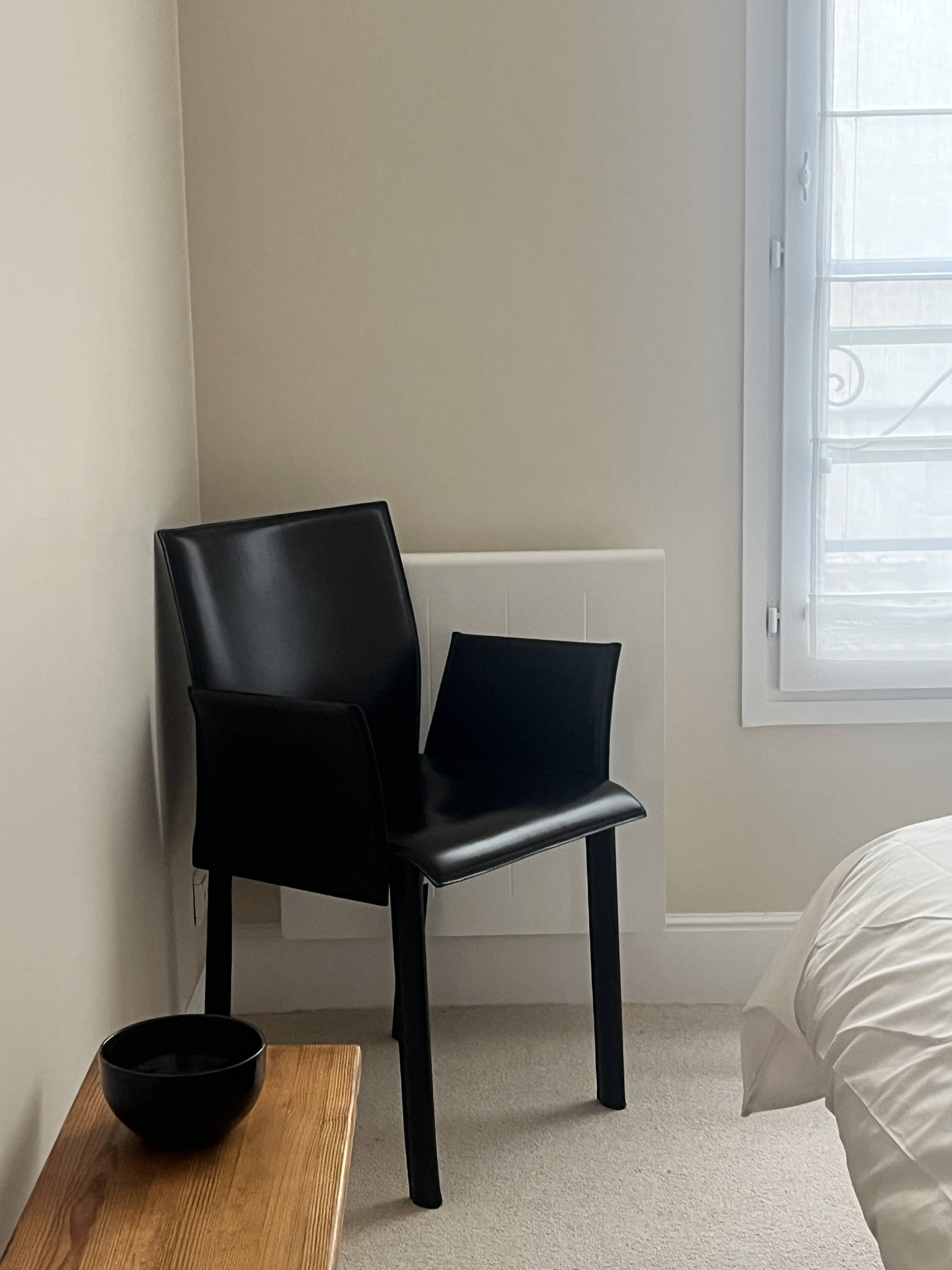 Office chair with armrests in thick black leather, Cattelan Italy.
