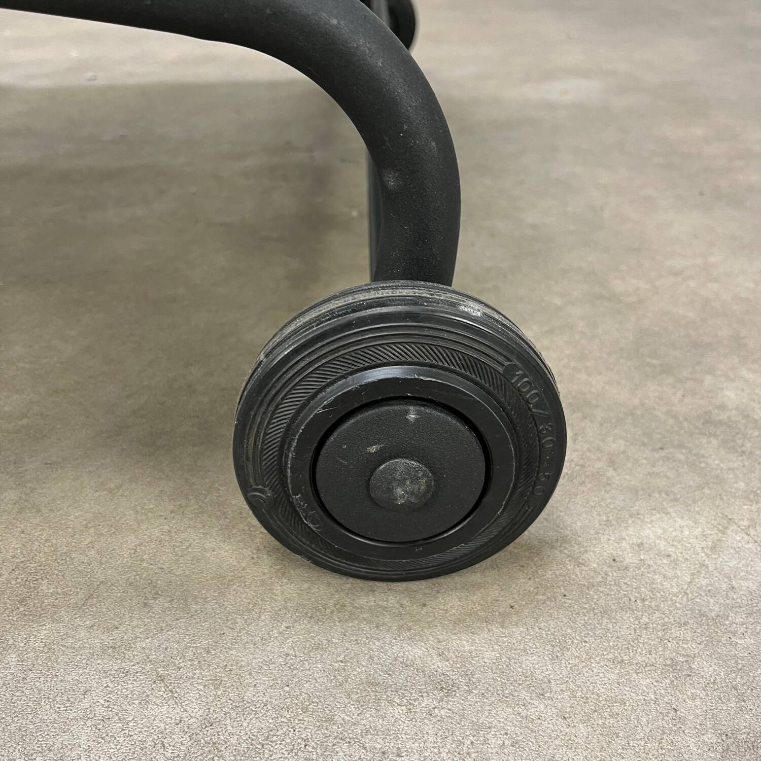 Postmodern design armchair and ottoman, 80s leather