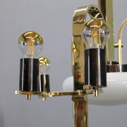 1930s Czech Art Deco brass chandelier with milk glass center and exposed bulbs