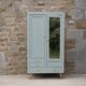 Vintage Parisian wardrobe in sage green – Mirror, hanging space and drawers