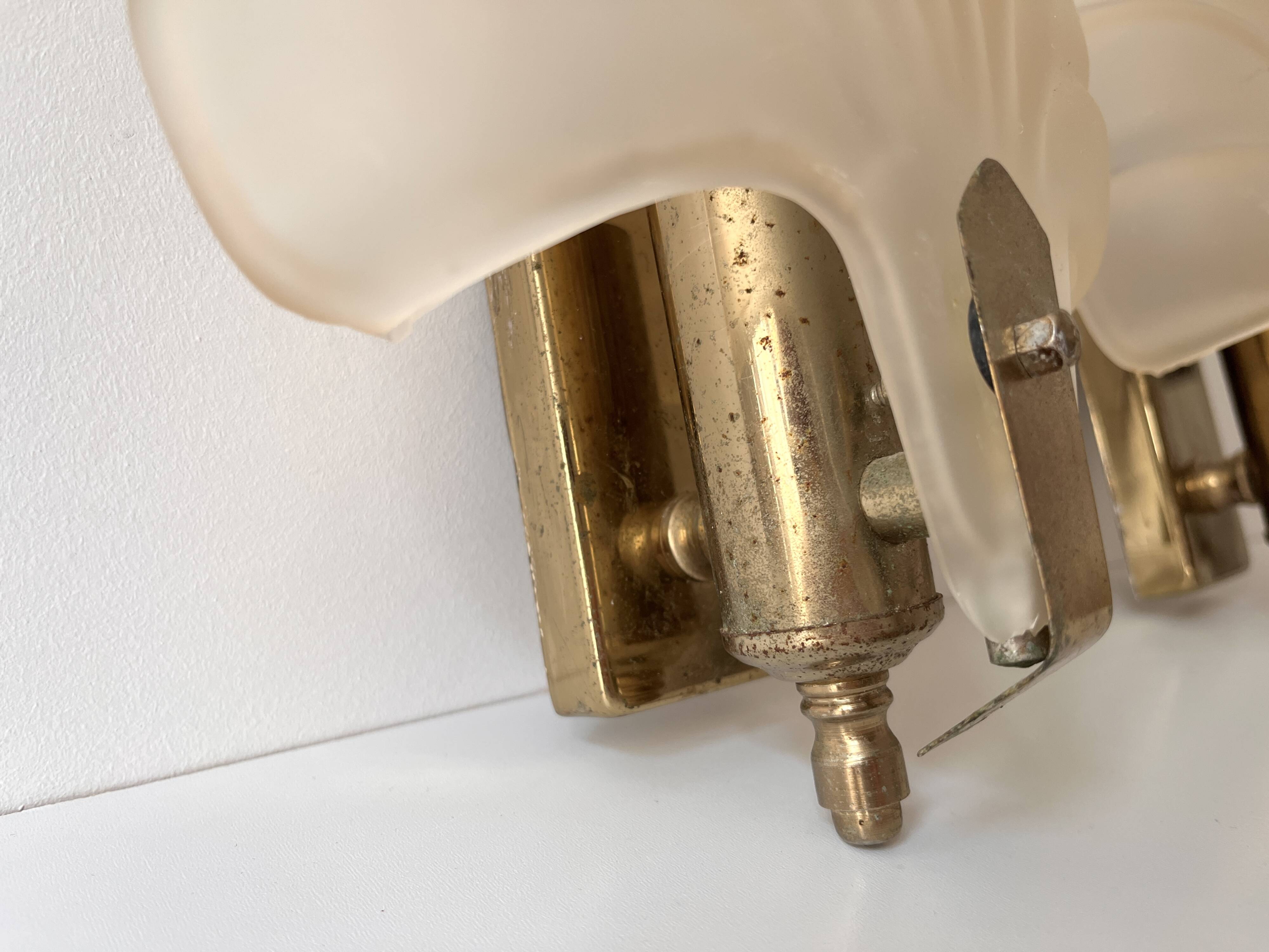 Pair of vintage shell glass wall lights, Art Deco style fixtures.