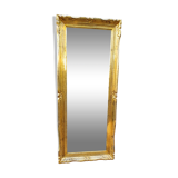 narrow gilded mirror in Louis XV style