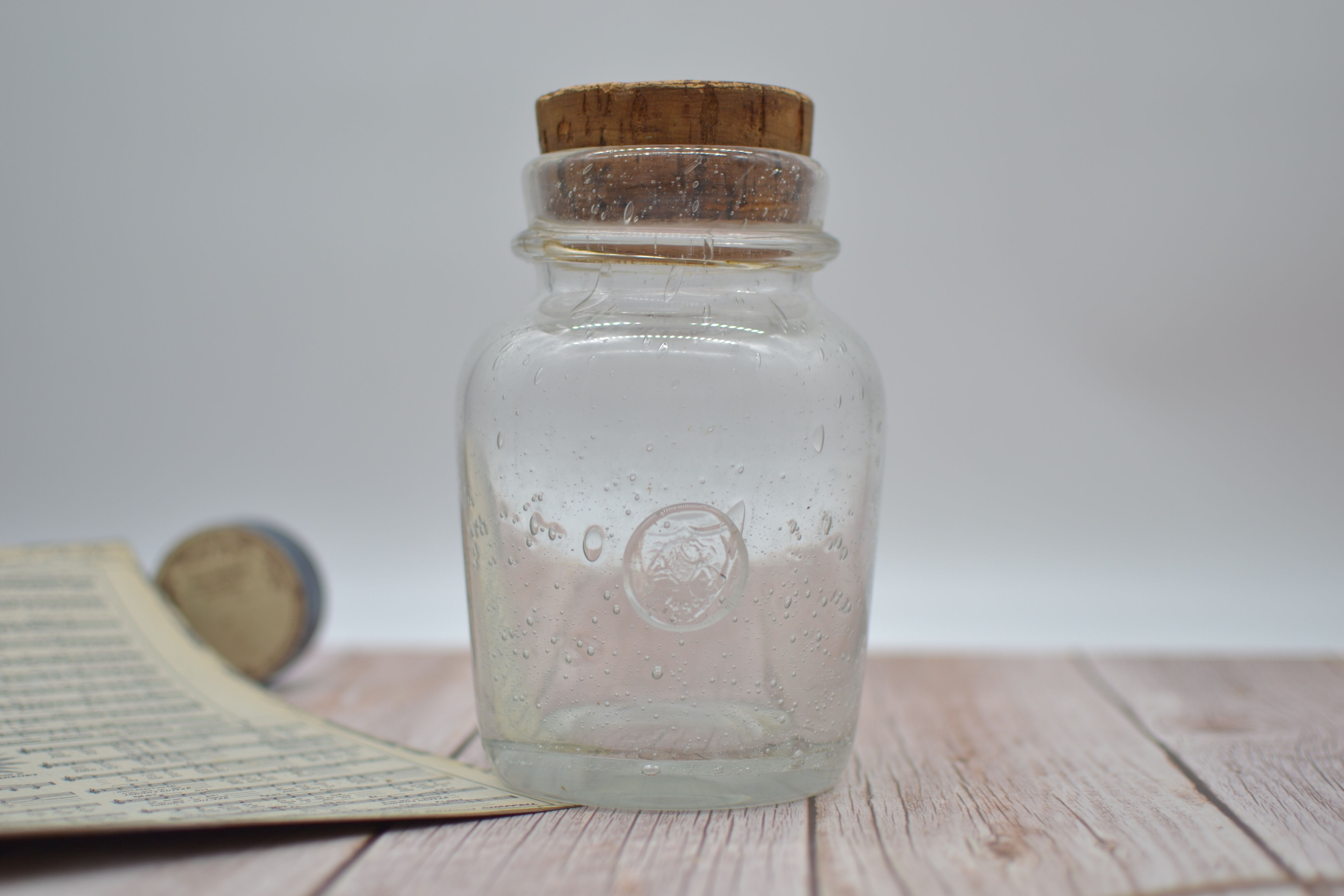 Blown glass jar with original cap