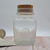 Blown glass jar with original cap