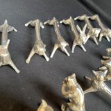 12 animal knife holders in tin