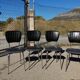 Series of 4 vintage black skai chairs - Vanac Aix