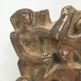 Plaster sculpture depicting a group of 3 figures