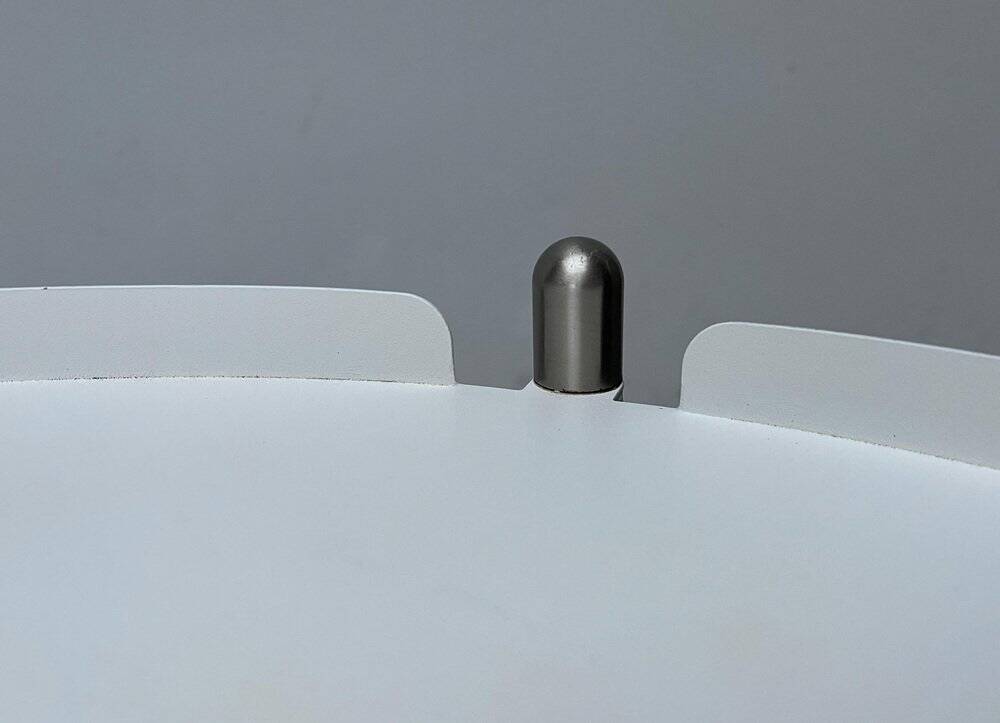 Minimalist Thrill metal coffee table or side table with wheels by Leitmotiv.