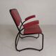 Set of 4 armchairs and a coffee table with tubular structure in Bauhaus style, 1950s.