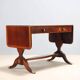 Antique mahogany desk with ebony and maple finishes, United Kingdom, 20th century.