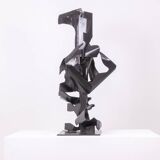 Jean Campa. Vertical sculpture in patinated metal. 1980s.