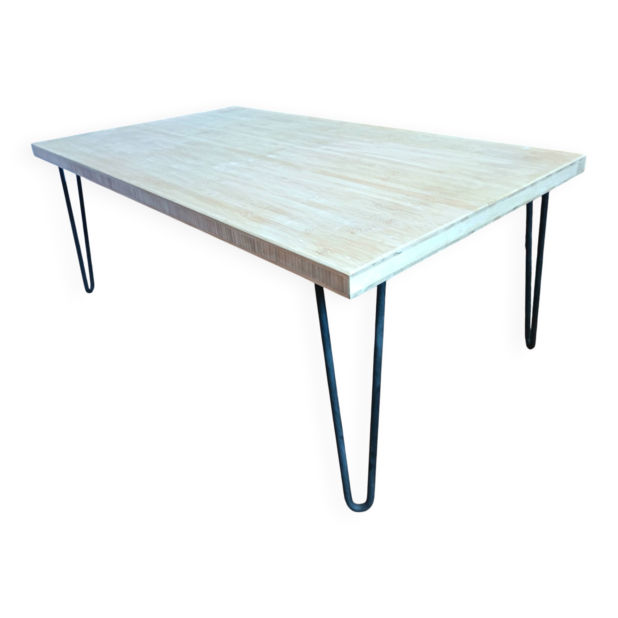 Coffee table in solid bamboo with steel legs.