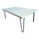 Coffee table in solid bamboo with steel legs.