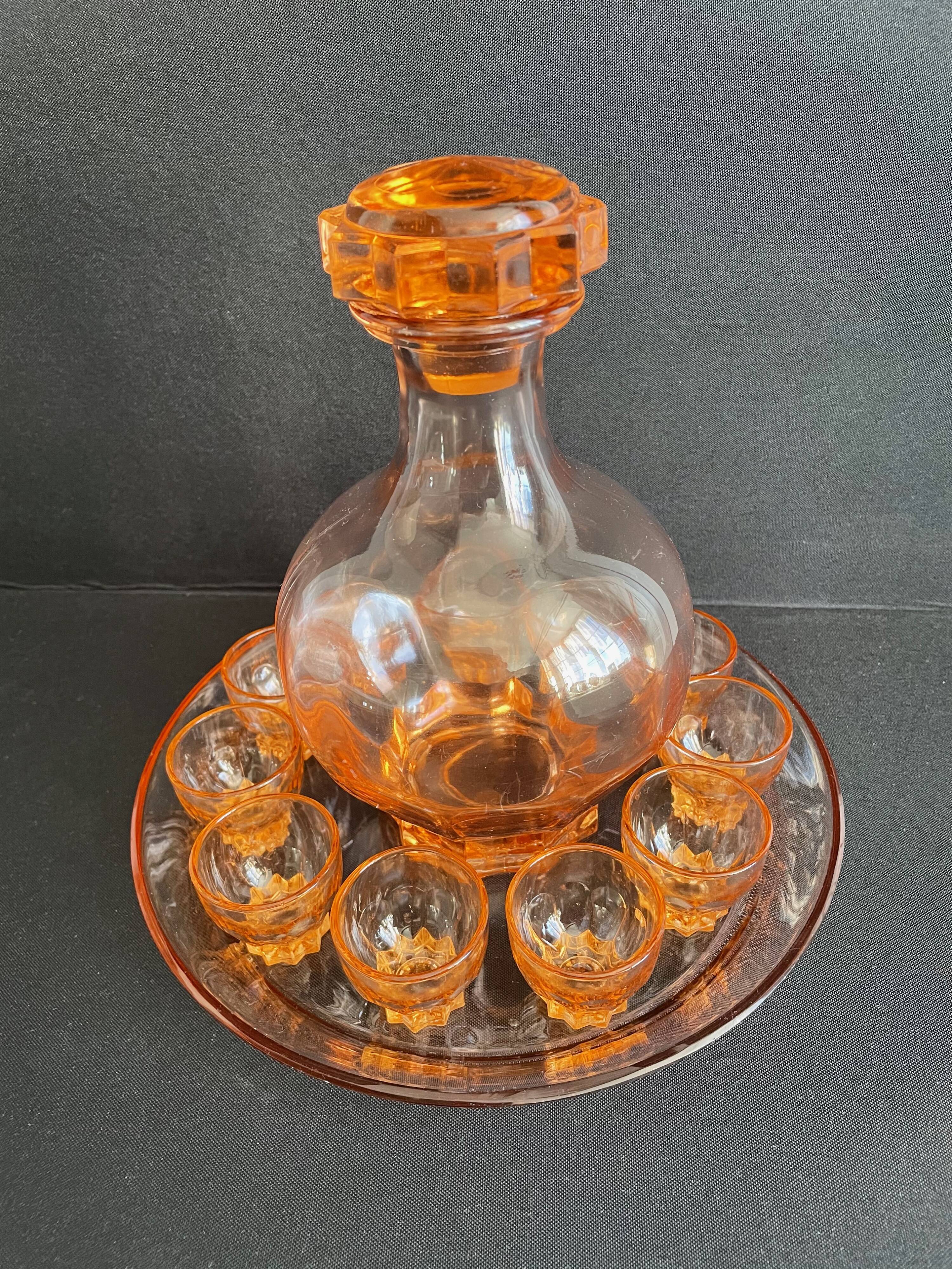 Liquor service in pink moulded glass