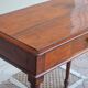 Centre writing table in stained wood