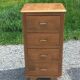 Vintage oak chest of drawers with tapered legs from the 1950s.