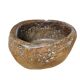 A substantial hand-hewn wooden bowl carved from a single burl section