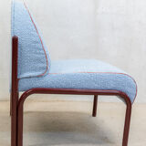 Souvignet armchair reupholstered in sky blue boucle.