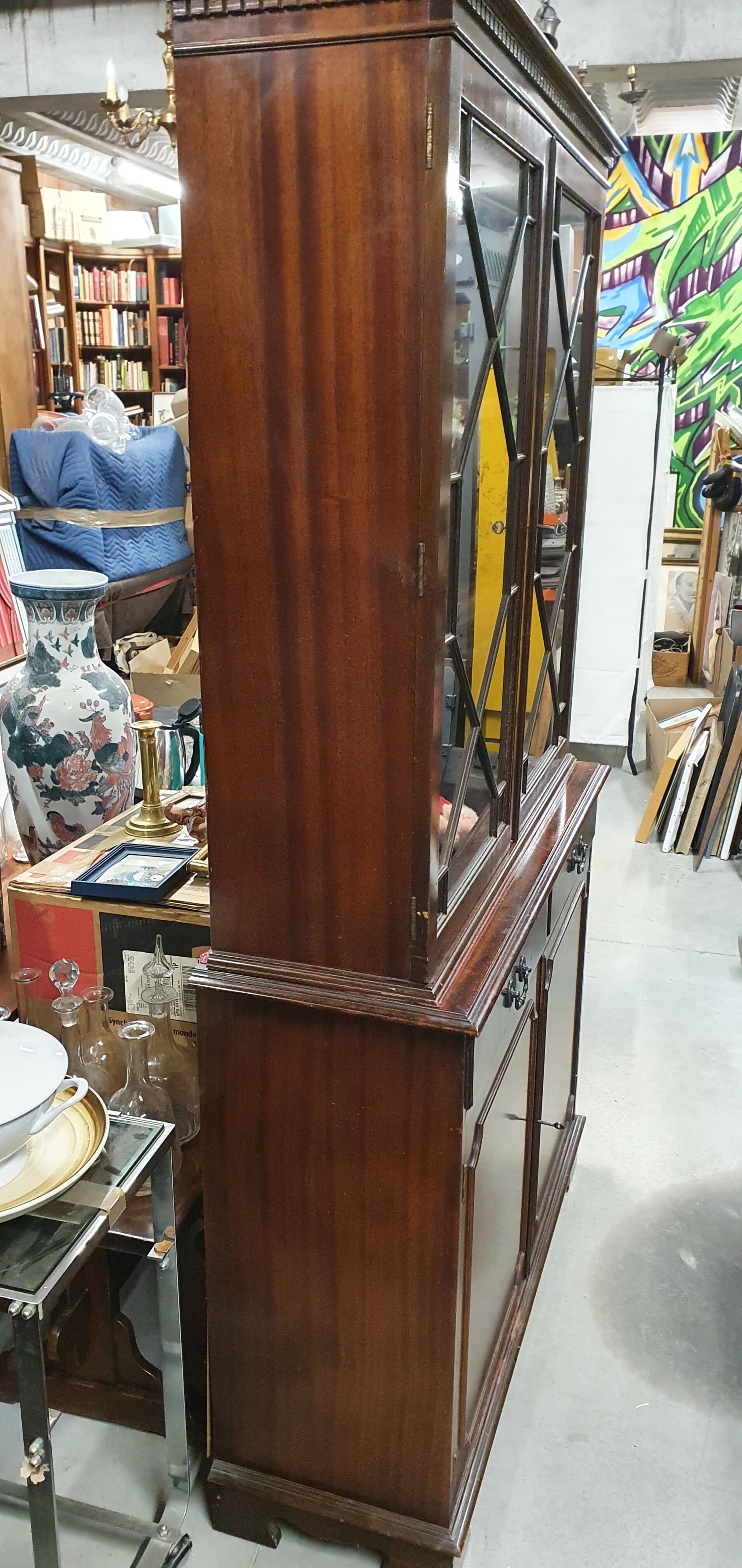 English showcase, two bodies, solid mahogany an of the 50s