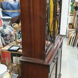English showcase, two bodies, solid mahogany an of the 50s