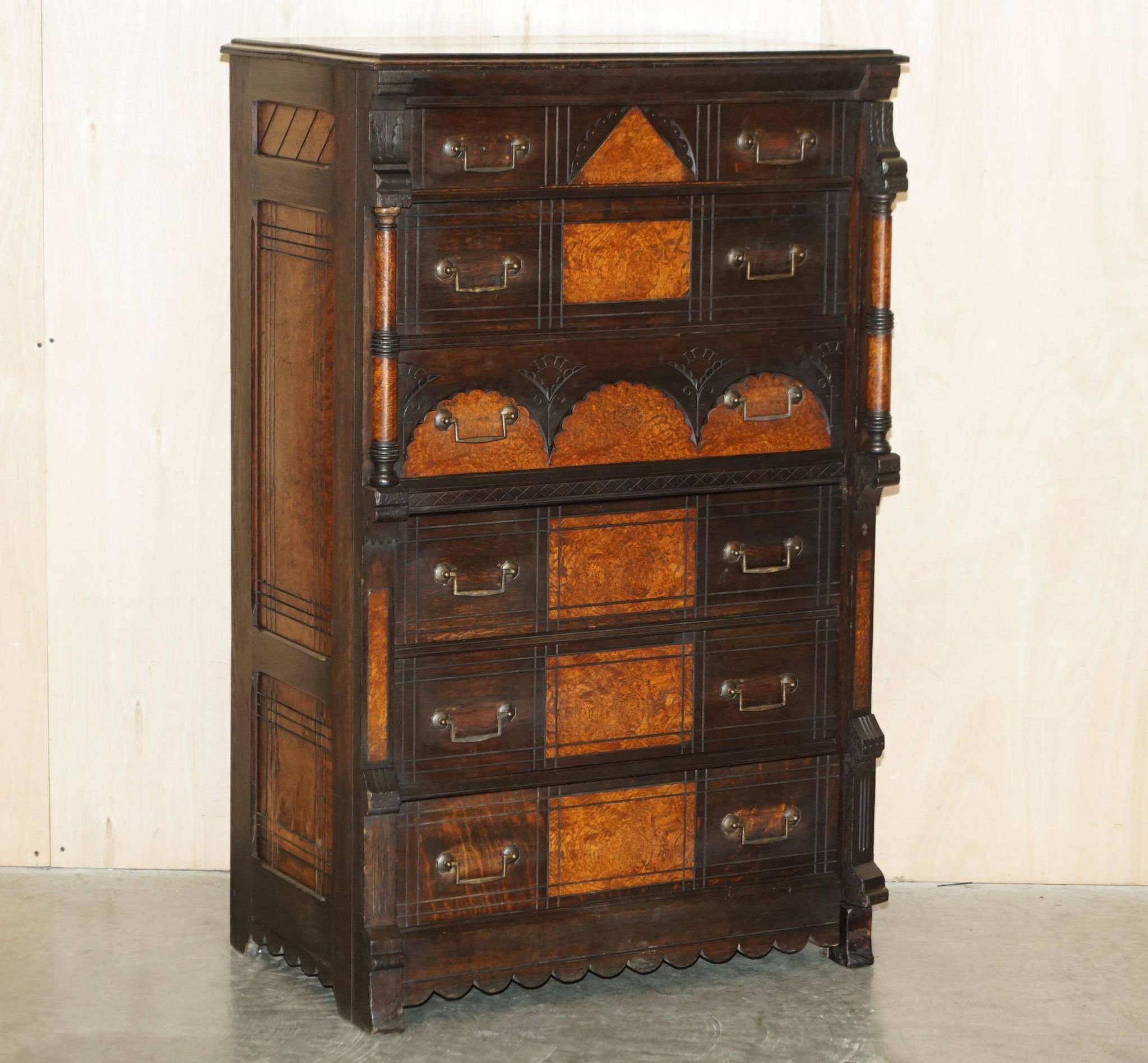 Victorian Wellington chest in figured elm by R Crosby & Son with 160 seal impressions.