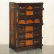 Victorian Wellington chest in figured elm by R Crosby & Son with 160 seal impressions.