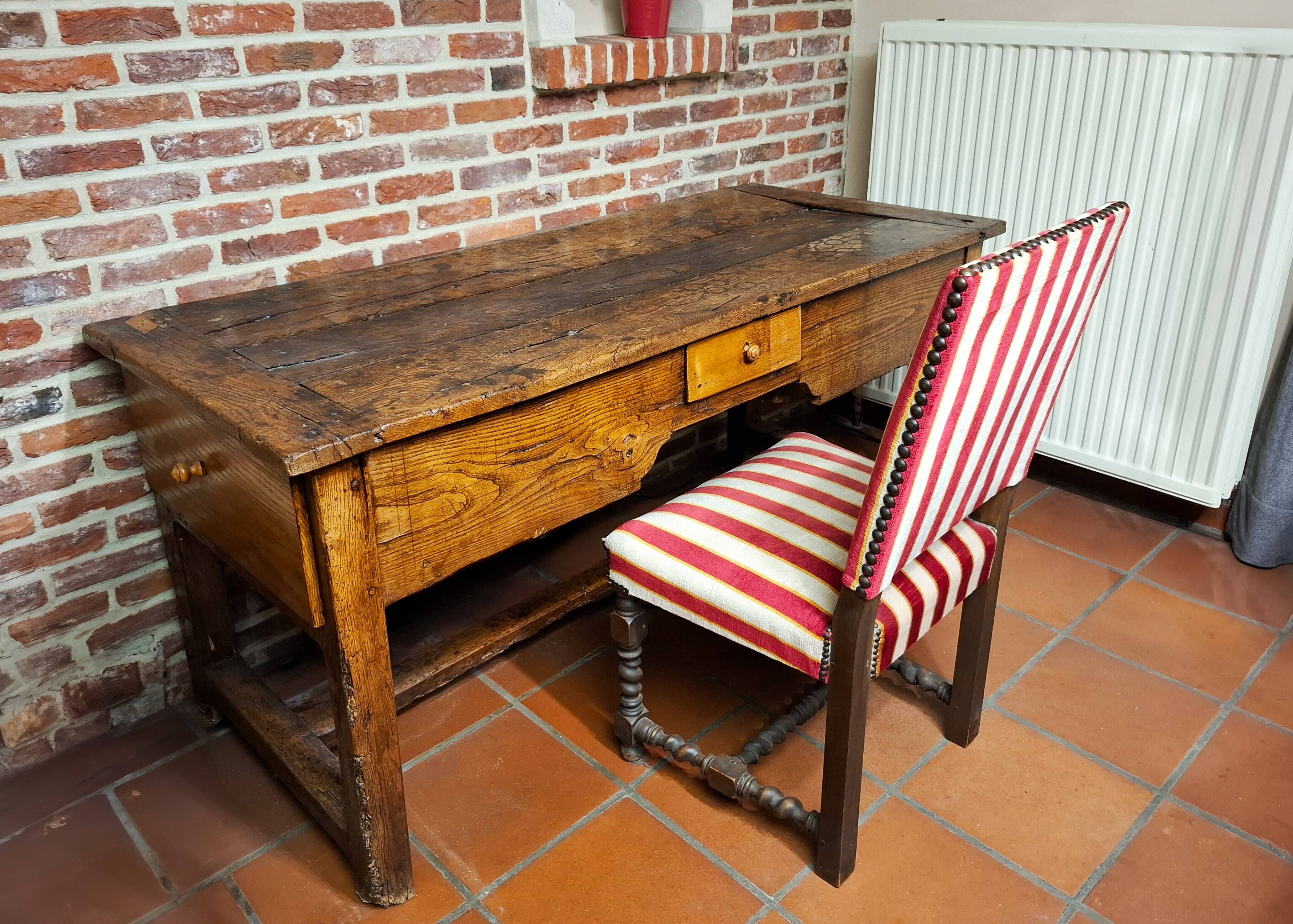 Antique desk accompanied by its chair – first half of the 18th century.