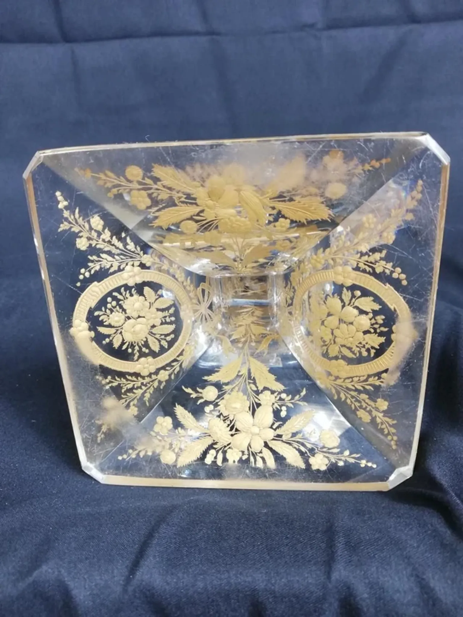 Antique glass candle holder, engraved and gilded.
