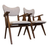 Pair of modernist Scandinavian bridge armchairs in teak, Denmark 1950.